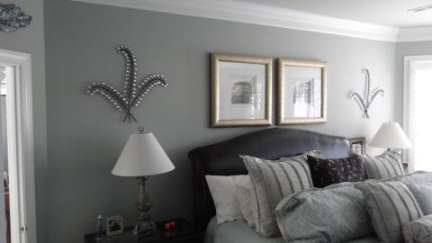Contemporary Bedroom with silver base bed side lamp with white shade