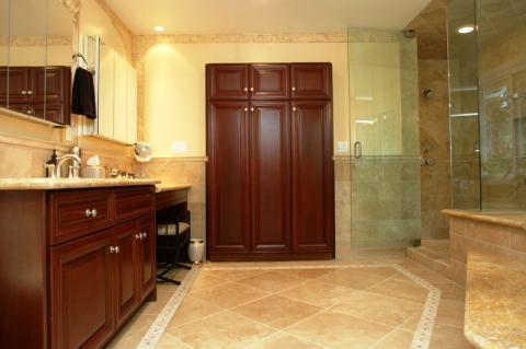 Transitional Master Bathroom with dark wood stained vanity cabinet