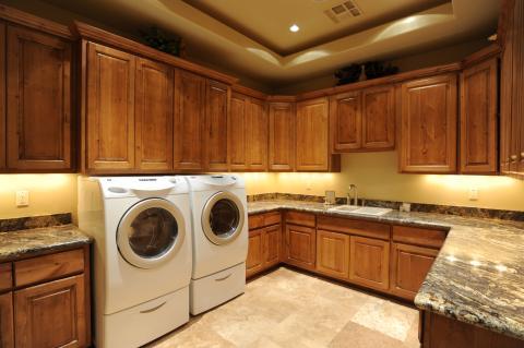Transitional Closet with under cabinet lighting