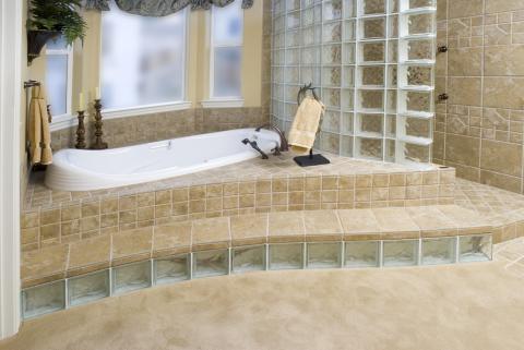 Traditional Master Bathroom with dark wood candle stick holders