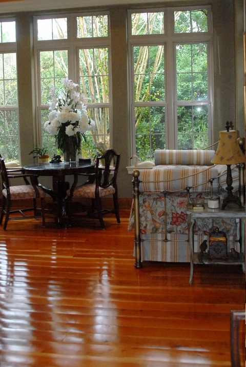 Eclectic Family Room with large white flower arrangement