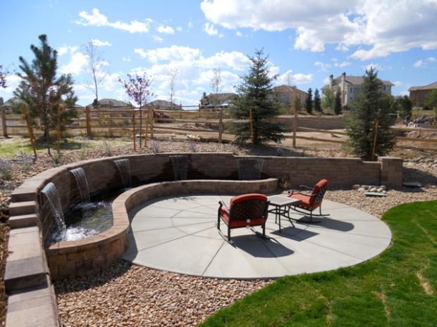 Rustic Patio with wrought iron rocking chair