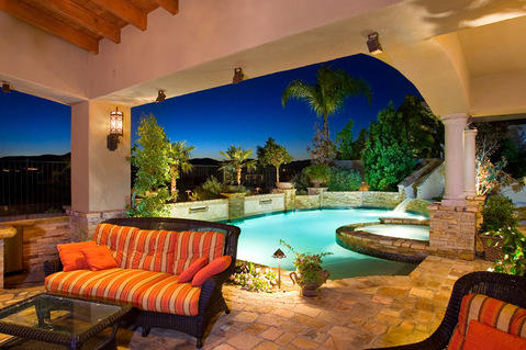 Traditional Patio with stacked rock pool walls