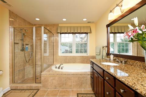 Traditional Bathroom with white trim windows with white moulding