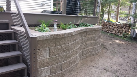 Modern Landscape with gray engineered retaining wall blocks