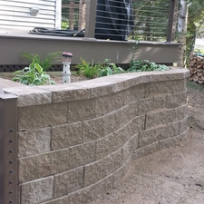 Modern Landscape with gray engineered retaining wall blocks
