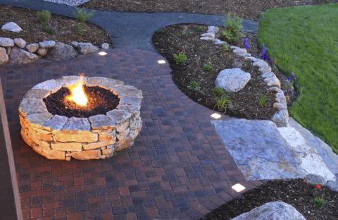 Traditional Patio with dark brown brick patio flooring