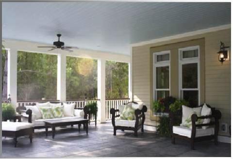 Eclectic Patio with wood patio furniture