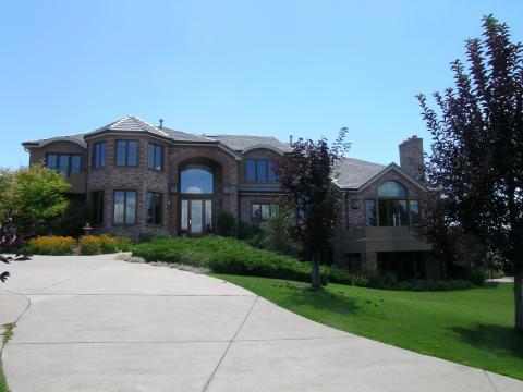 Traditional Driveway with brick home exterior