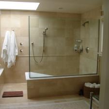 Traditional Master Bathroom with chrome sliding bar shower head
