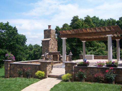 Traditional Patio with outdoor lantern style lighting