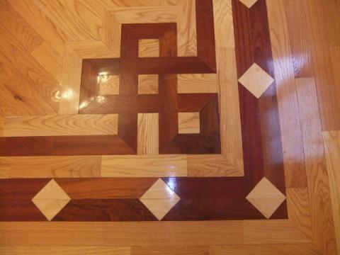 Contemporary Dining Room with border in wood floor