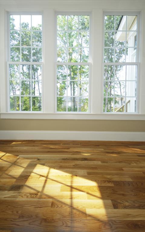 Traditional Living Room with beige painted walls
