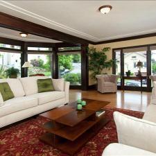 Contemporary Family Room with gray chesterfield chairs