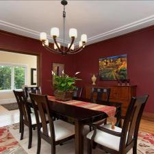 Transitional Dining Room with dark wood dining table and chairs