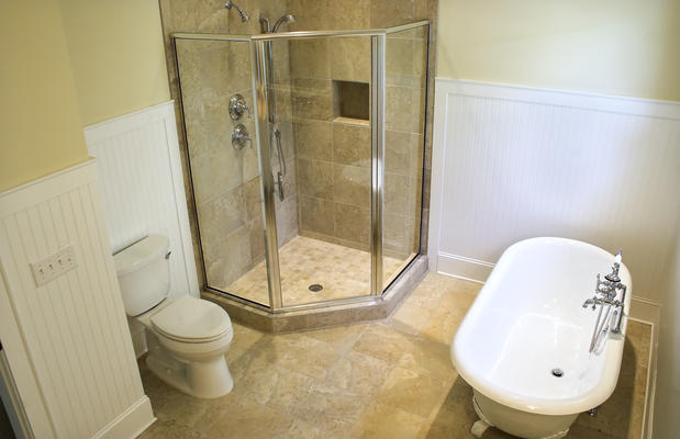 Traditional Master Bathroom with glass shower walls
