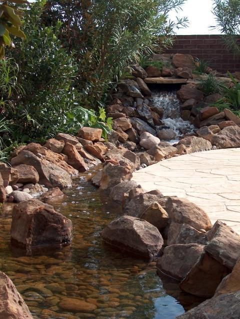 Traditional Landscape with water continues into small water pond