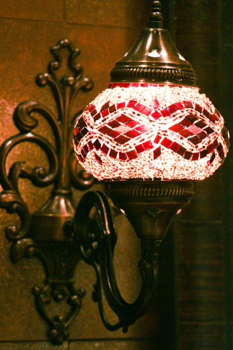 Eclectic Bathroom with hand beaded wall sconce