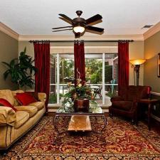 Traditional Living Room with white framed windows and doors