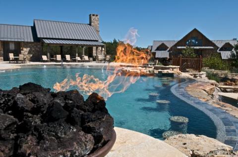 Contemporary Pool with large resort style pool