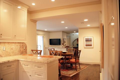 Traditional Kitchen with medium wood dining table and chairs