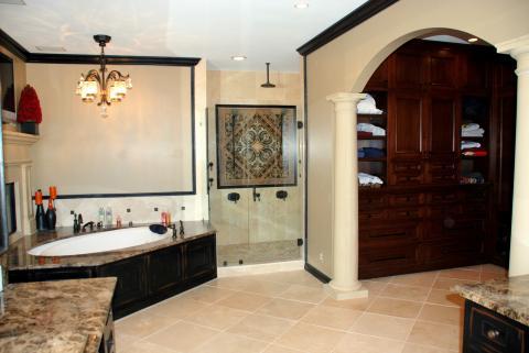 Traditional Master Bathroom with black tile diamond accents