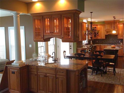 Traditional Family Room with black and dark wood stained dining furniture