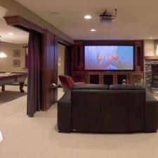Transitional Home Theater with floor to ceiling curtains