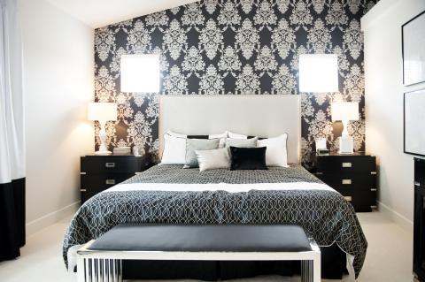 Eclectic Bedroom with white upholstered head board