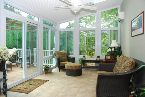 Traditional Sunroom with large sliding glass door