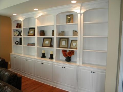 Traditional Family Room with dark brown leather sofa