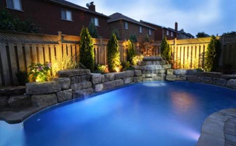 Traditional Pool with waterfall into the pool