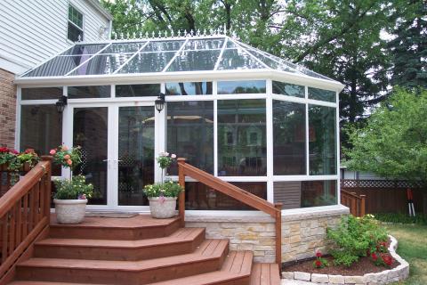 Traditional Patio with white brick trimmed flower bed