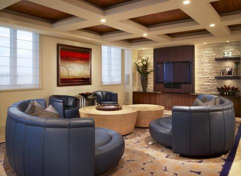 Contemporary Family Room with patterned blue and yellow area rug