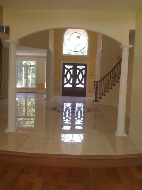 Traditional Entry with yellow painted entry wall