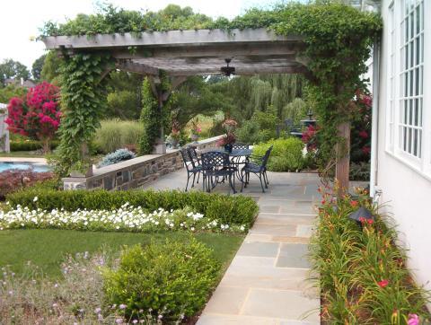 Traditional Patio with black metal outdoor patio furniture