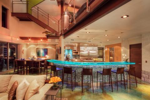 Contemporary Family Room with blue lights in glass counter