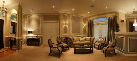 Traditional Living Room with ceiling to floor drapes