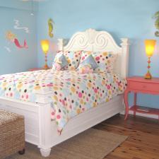 Contemporary Kids Room with tan grass cloth area rug