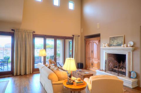 Traditional Living Room with dark wood framed windows and doors