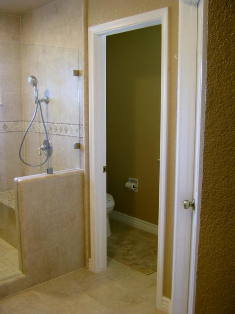 Contemporary Master Bathroom with built in shower bench