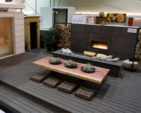 Eclectic Dining Room with dark grey stone fireplace