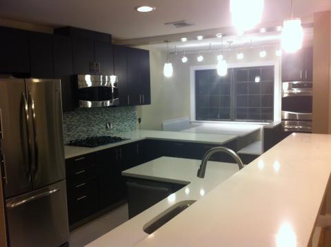 Traditional Kitchen with small light gray tile back splash
