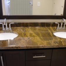 Contemporary Master Bathroom with stainless steel cabinet hardware