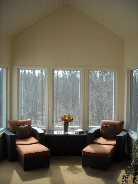 Contemporary Sunroom with floral arrangement