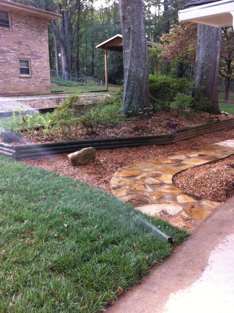 Eclectic Landscape with mortared stone walkway