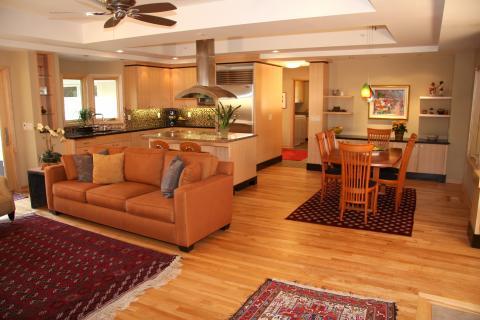 Contemporary Family Room with medium wood stained dining table