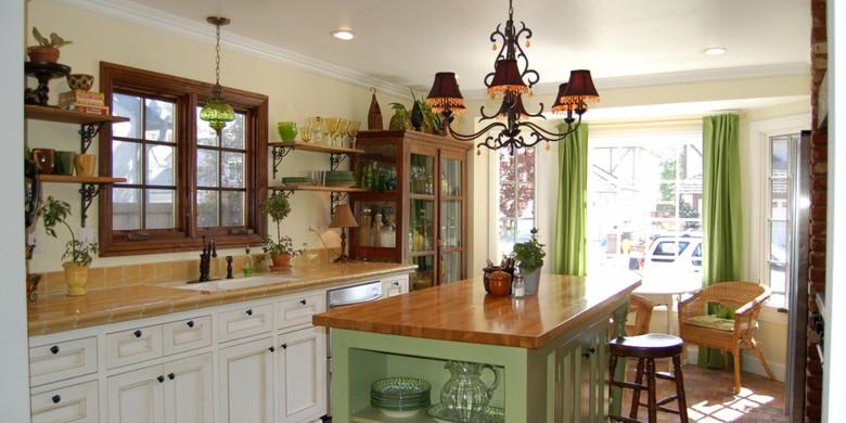 #htmlcaption2 Cottage Kitchen with tall dark wood china cabinet with glass doors