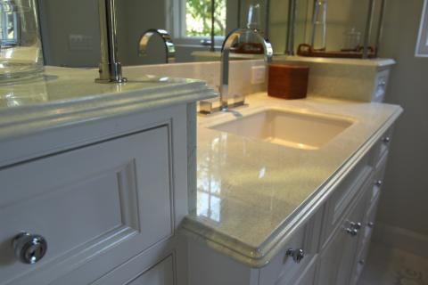 Transitional Master Bathroom with white granite counters