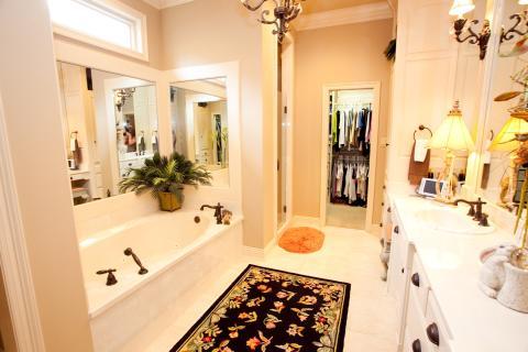 Transitional Master Bathroom with long horizontal window above tub